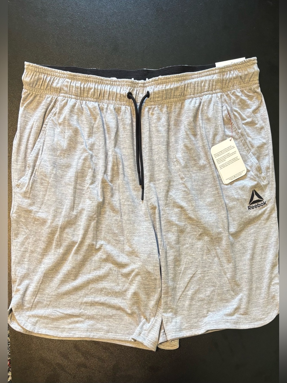 Reebok Men’s Light Gray Athletic Shorts with Black Drawstring